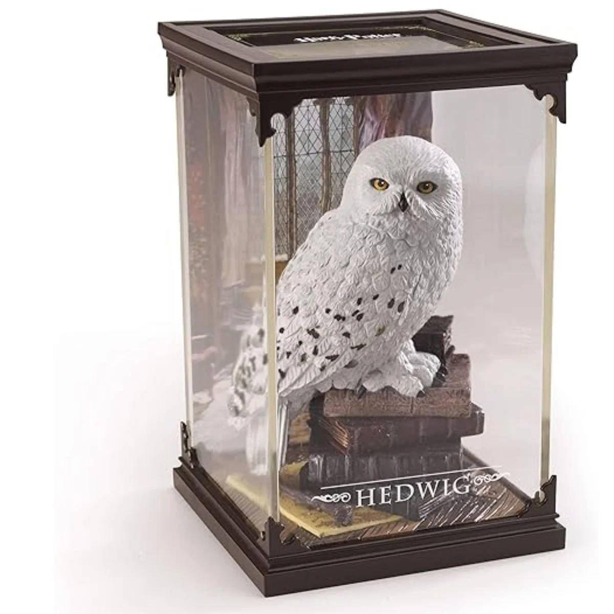 Figura coleccionable de Hedwig en vitrina Harry Potter