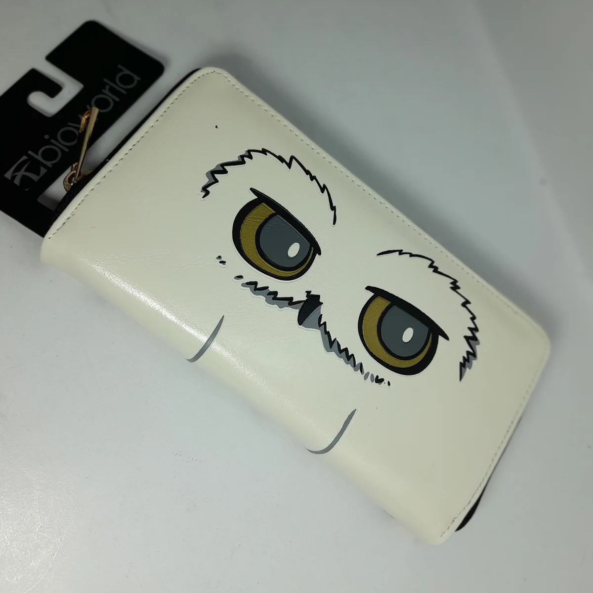Billetera blanca Hedwig Harry Potter con ojos dorados