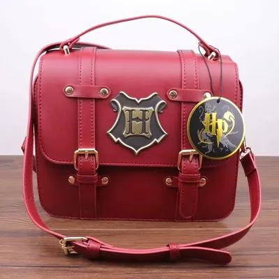 Bolso cartero Hogwarts Harry Potter rojo vinotinto con escudo metálico