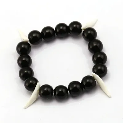 Pulsera negra con colmillos blancos Inuyasha