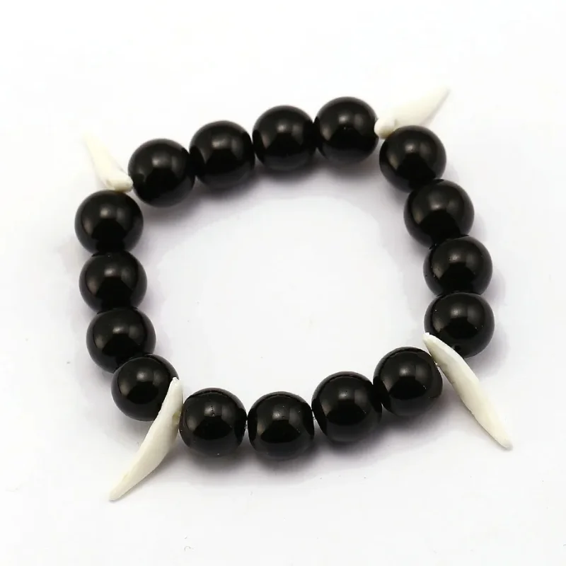 Pulsera negra con colmillos blancos Inuyasha