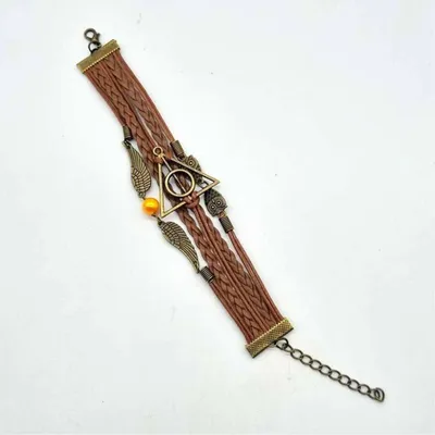 Pulsera Reliquias de la Muerte Harry Potter con símbolo triángulo y alas