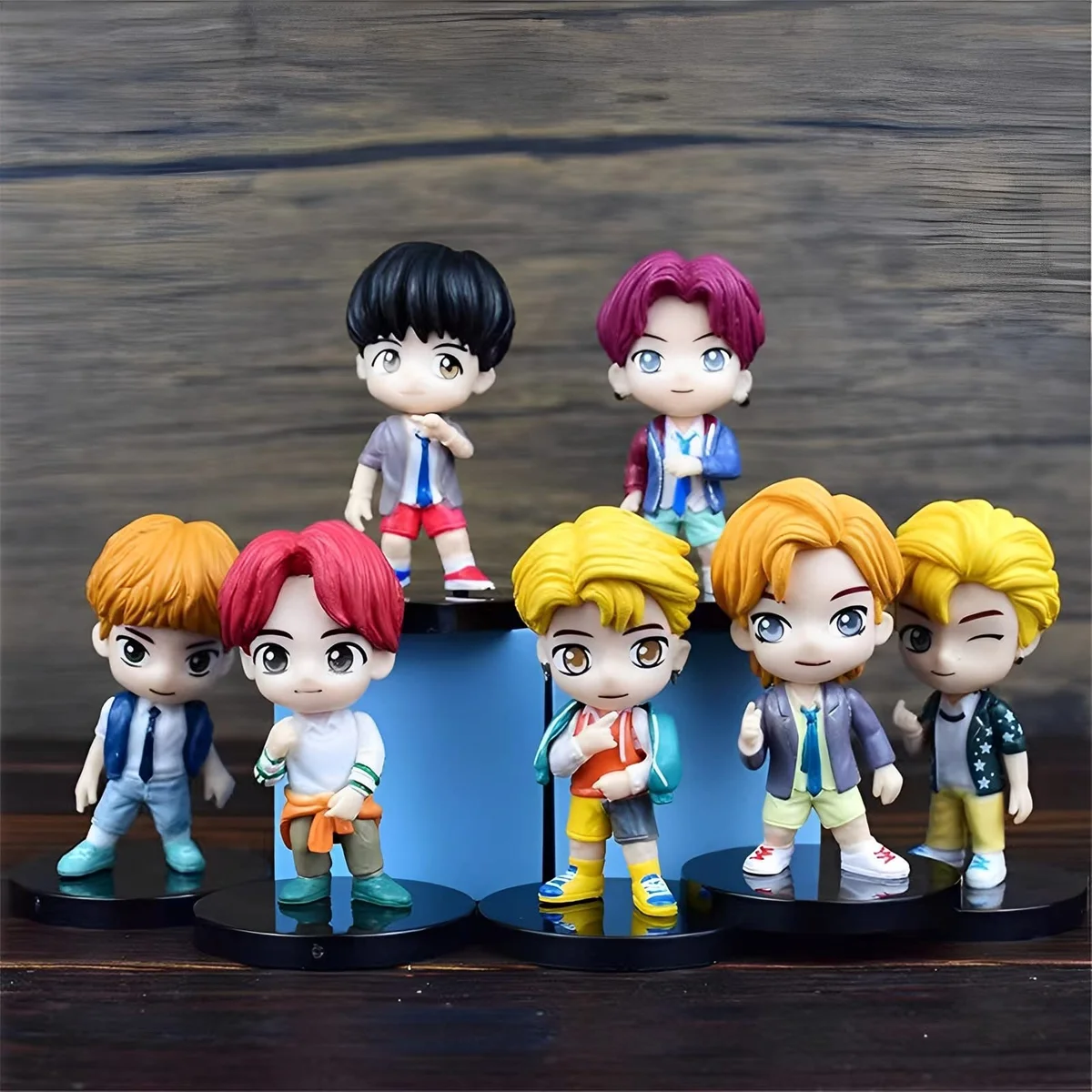 Set de 7 figuras chibi de BTS en bases negras