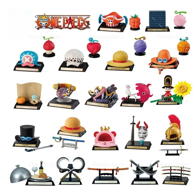 Colección de figuras decorativas One Piece con sombreros y accesorios de personajes