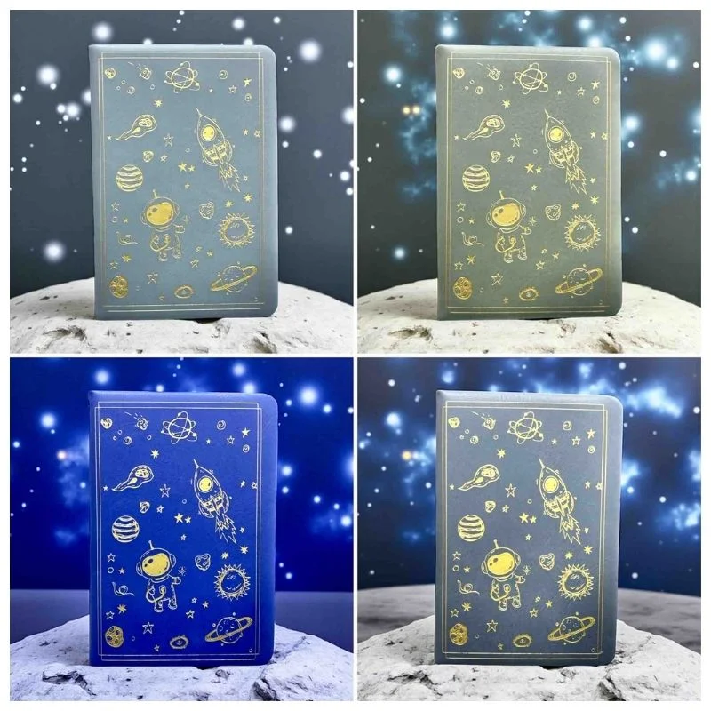 Cuaderno tapa dura astronauta y espacio con detalles dorados