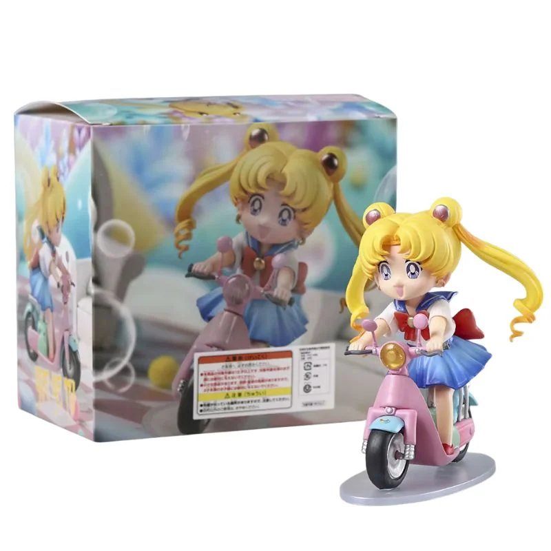 Figura Sailor Moon en motocicleta rosa con caja de presentación