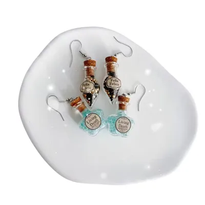 Aretes Harry Potter Felix Felicis y Filtro de Muertos en Vida