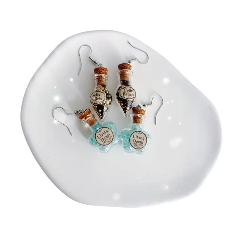 Aretes Harry Potter Felix Felicis y Filtro de Muertos en Vida