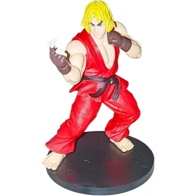 Figura Ken Masters Street Fighter con gi rojo y guantes de combate